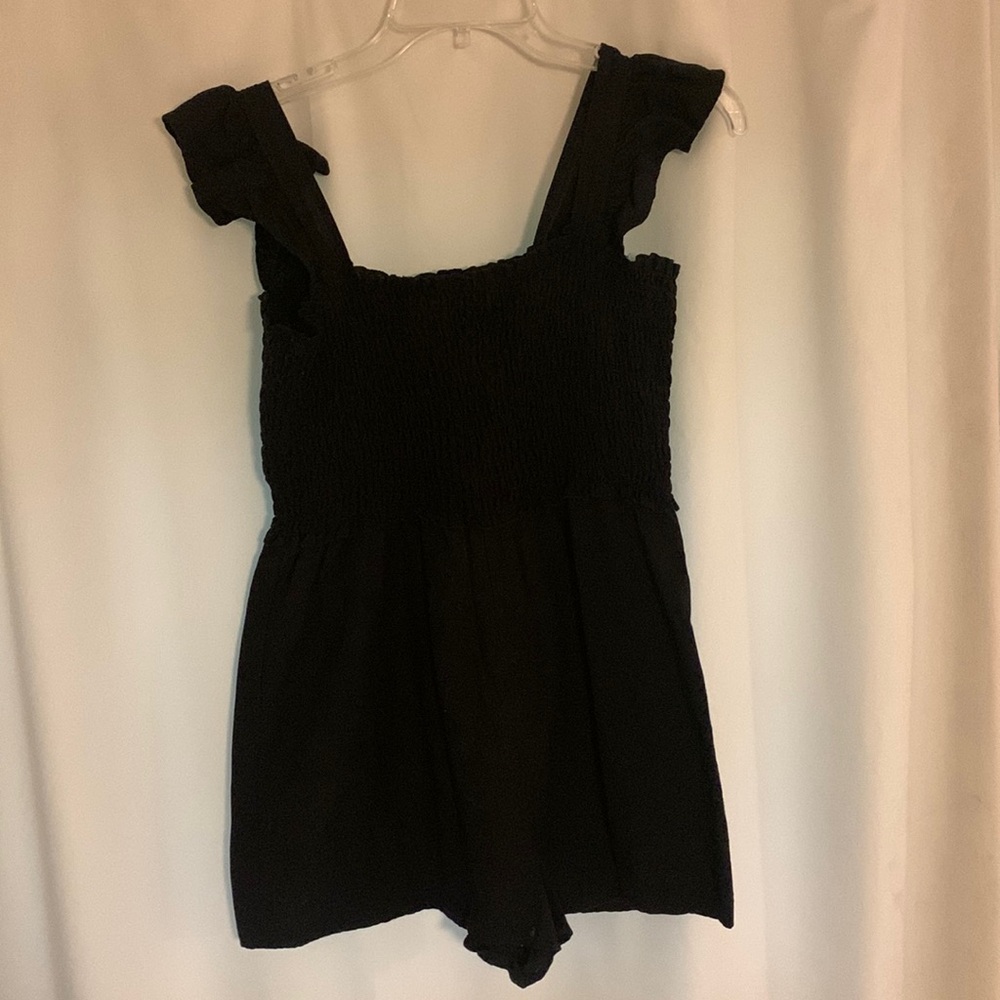 ASOS black linen romper. So cute fits like a true small.